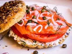 A bagel (Yiddish: ×‘×²×’×œ‎ baygl; Polish: bajgiel), also spelled beigel,[1] is a bread product originating in the Jewish communities of...